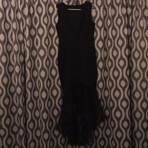 Black formal fitted dress.